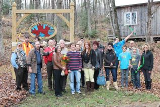 The Edwards Outdoor Education Centre officially opens at the NAEC in Cloyne. Archery students, snonsors, and Colin Edwards' family at the ribbon cutting. Photo: Devin Gagne-Baldachin.